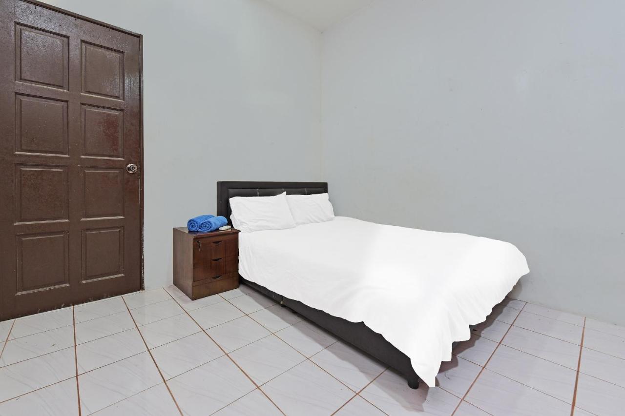 Oyo 90596 Casaria Inn Paka Exterior photo