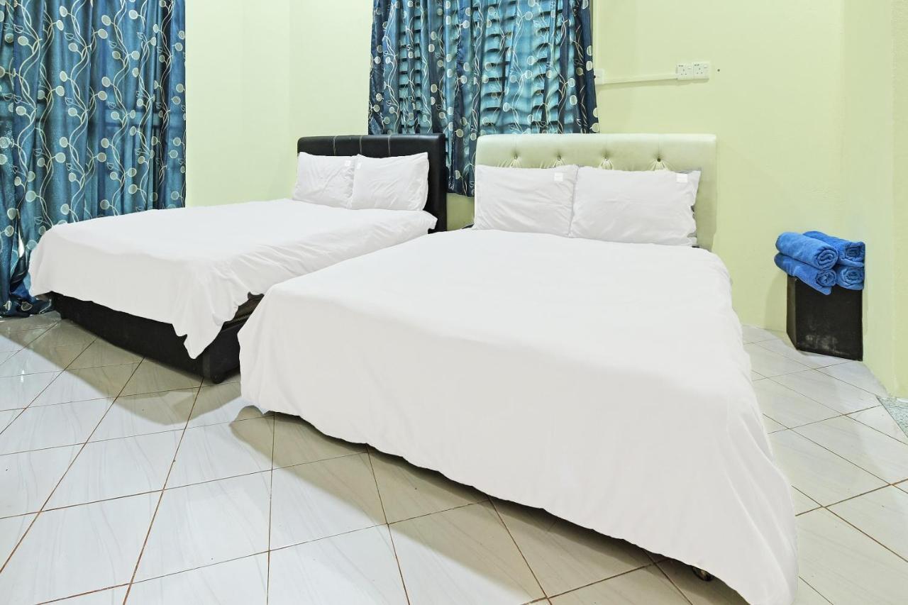 Oyo 90596 Casaria Inn Paka Exterior photo
