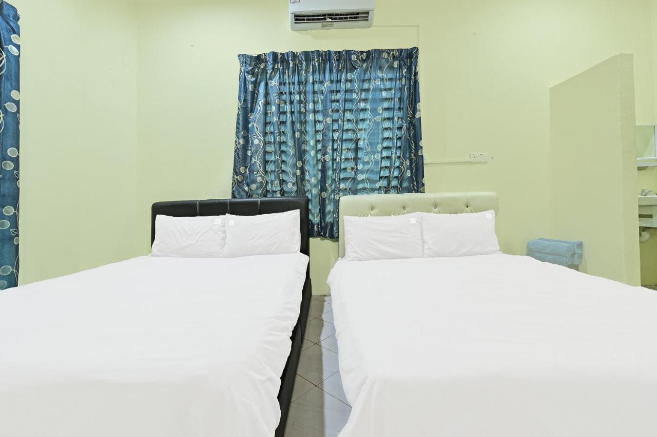 Oyo 90596 Casaria Inn Paka Exterior photo