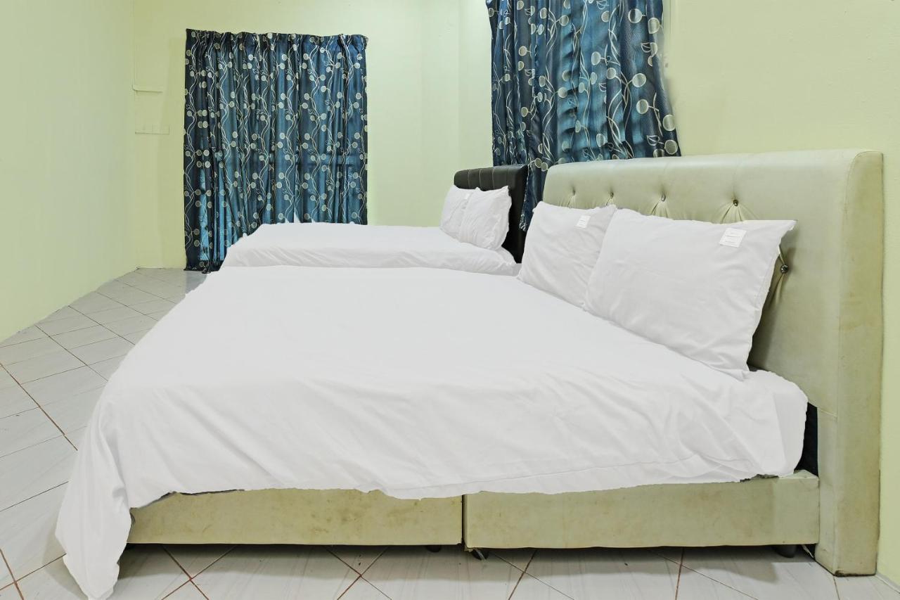 Oyo 90596 Casaria Inn Paka Exterior photo